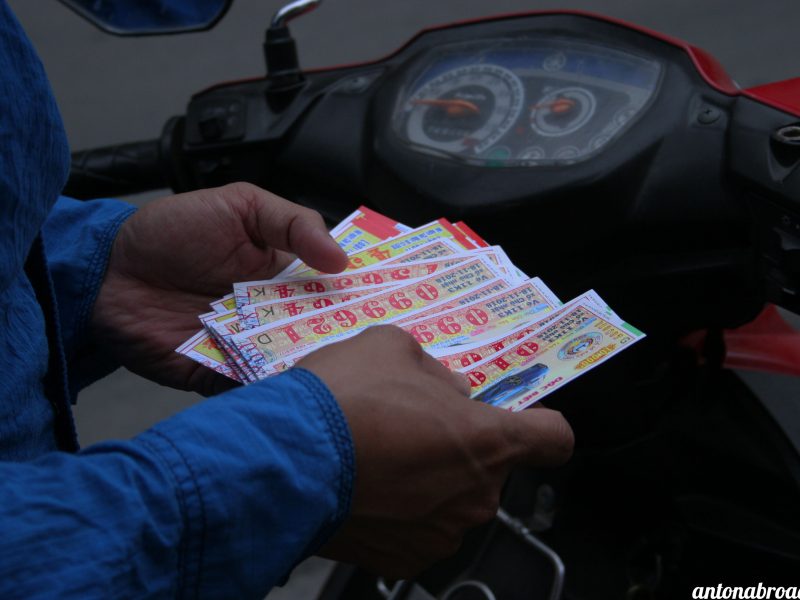 Ticket.Buyer.on.Motorbike.with branding